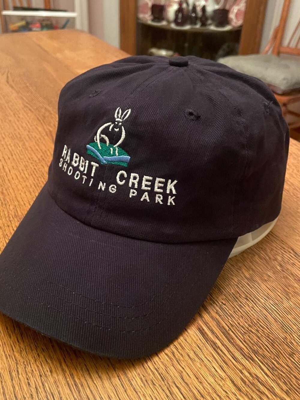 Rabbit Creek Shooting Park Black Hook and Loop Baseball Hat Cap by Fahrenheit